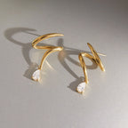 Waterproof Gold Spiral Claw Drop Earrings with Pear-Cut Zirconia