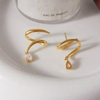 Waterproof Gold Spiral Claw Drop Earrings with Pear-Cut Zirconia