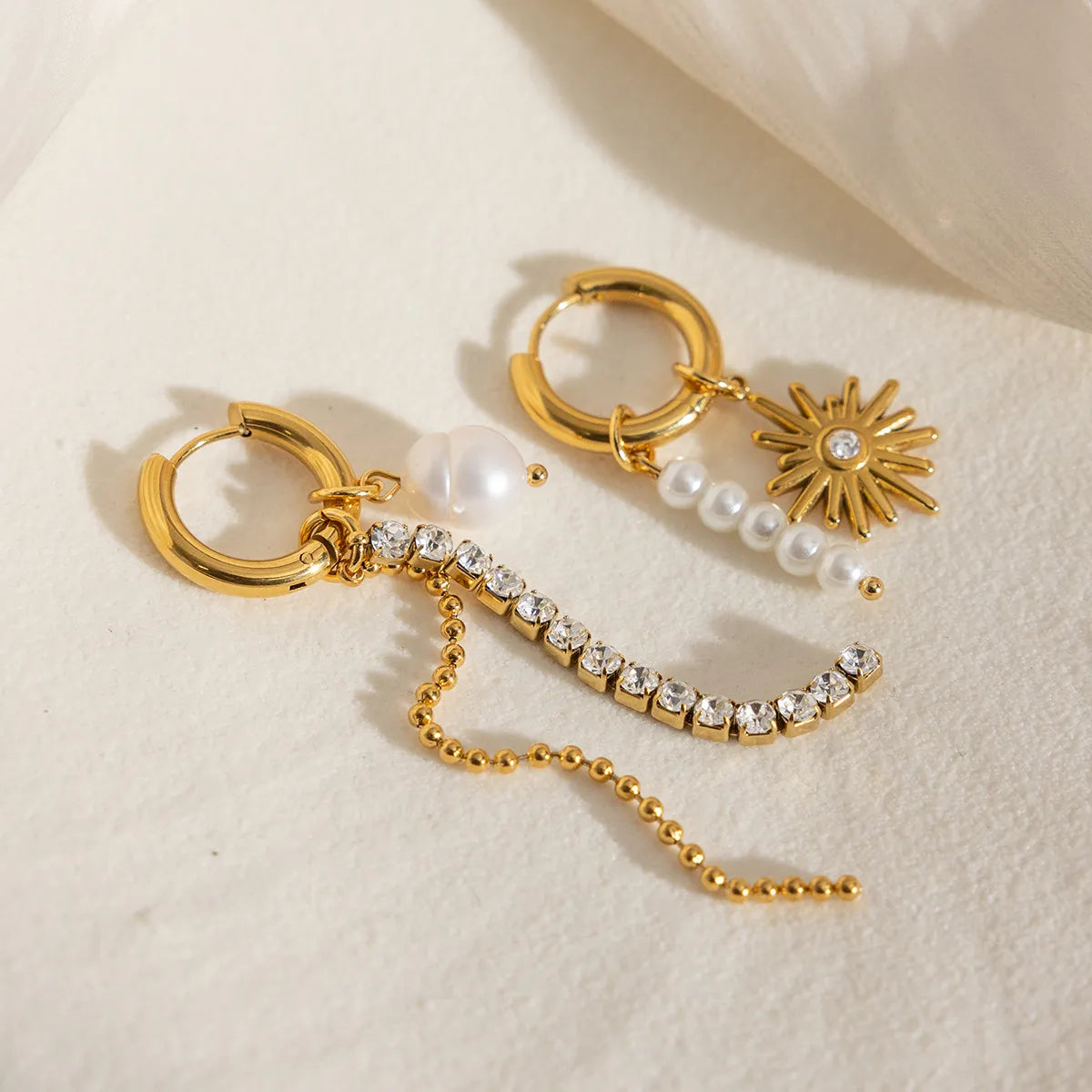 Asymmetric Pearl Sunburst Drop Earrings – Waterproof Steel